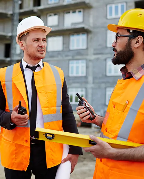 Two contractors discussing about the work 