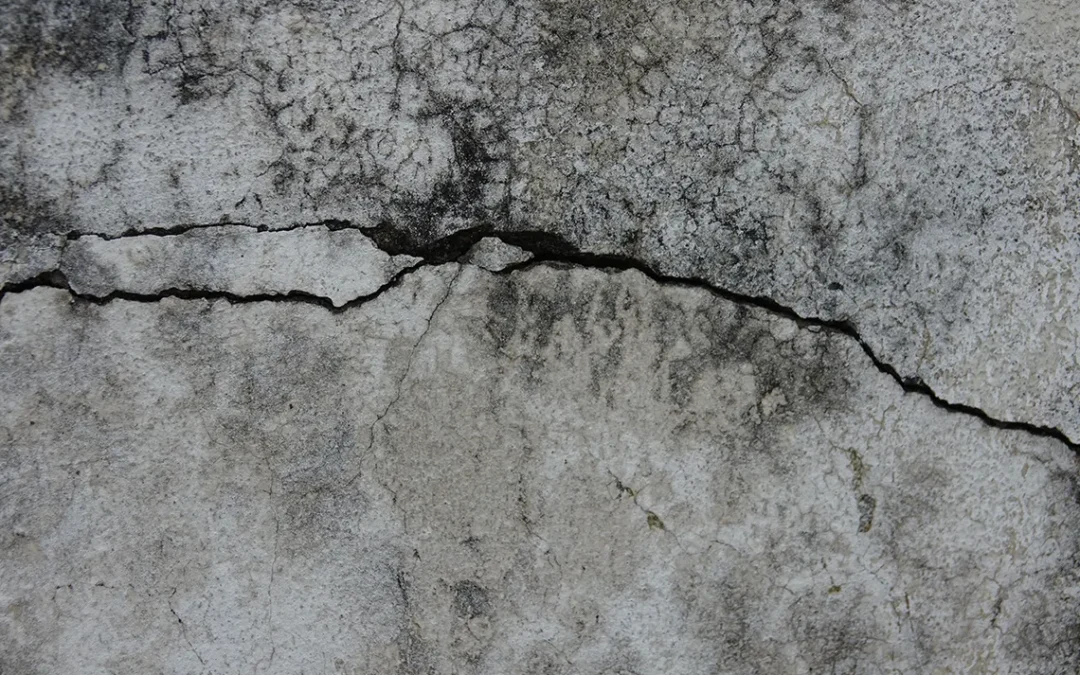 Sinking foundation signs. A large horizontal crack on the foundation wall showing sings of the foundation sinking