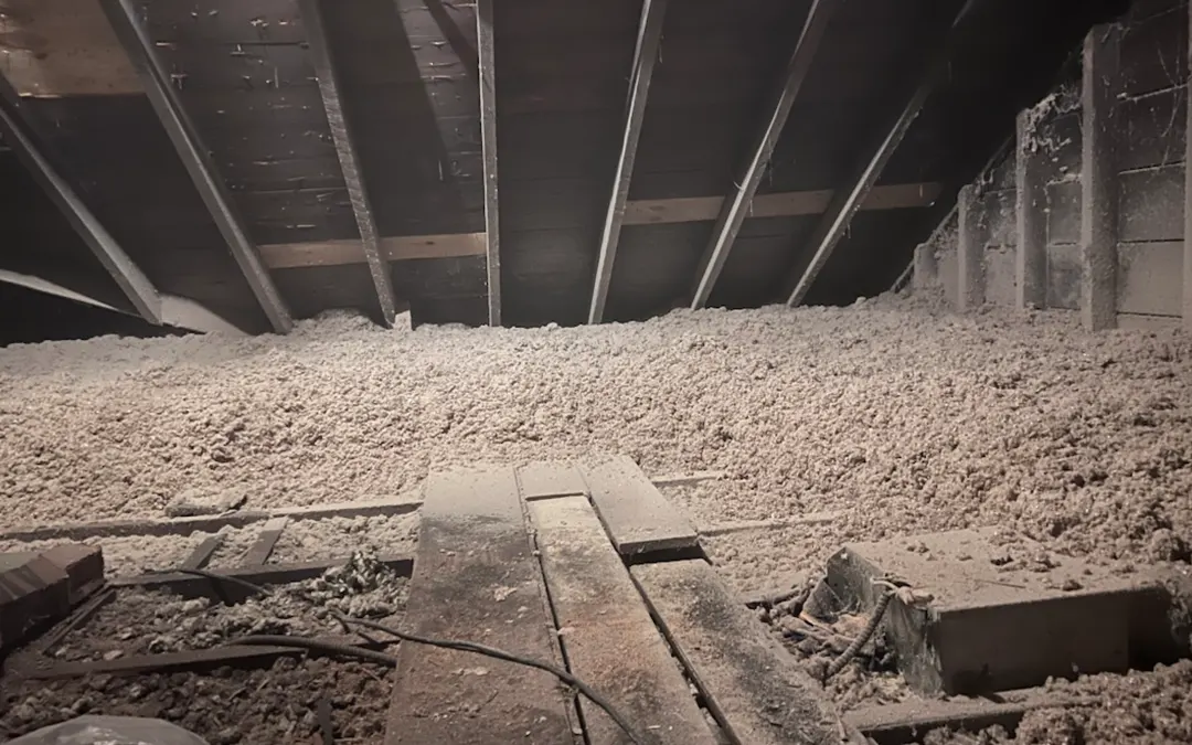 A newly installed cellulose insulation in the attic of a new property