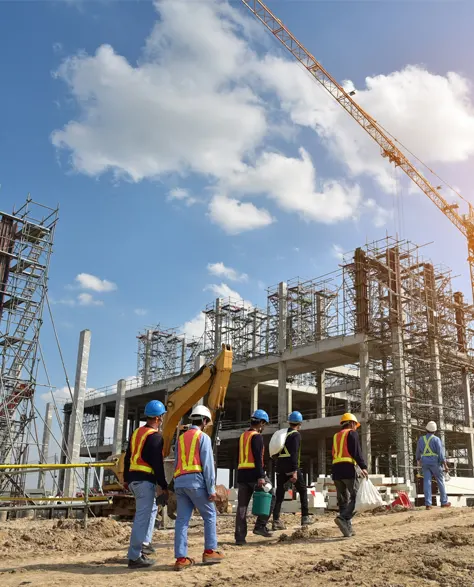 A view of a commercial building with steel beams under construction