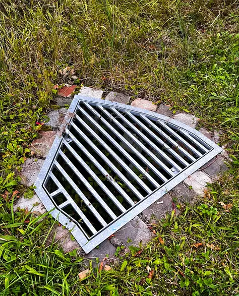 An exterior French drain system installed in a yard