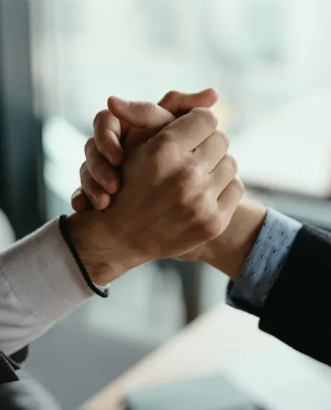 A handshake between a homeowner and zavza seal contractor