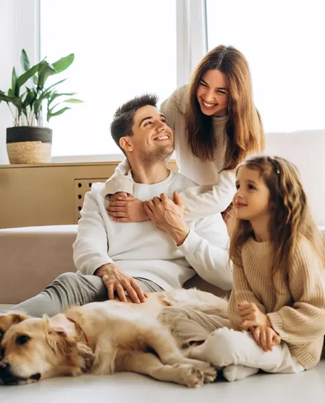 A happy family in their warm and insulated home that they got from rebates from Con Edison