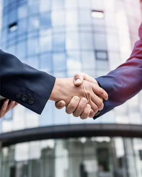 A homeowner and a zavza professional shaking hands to seal a deal over rebate from national grid