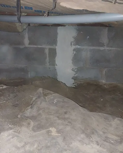 water damage in the basement which is in need of a vapor barrier 