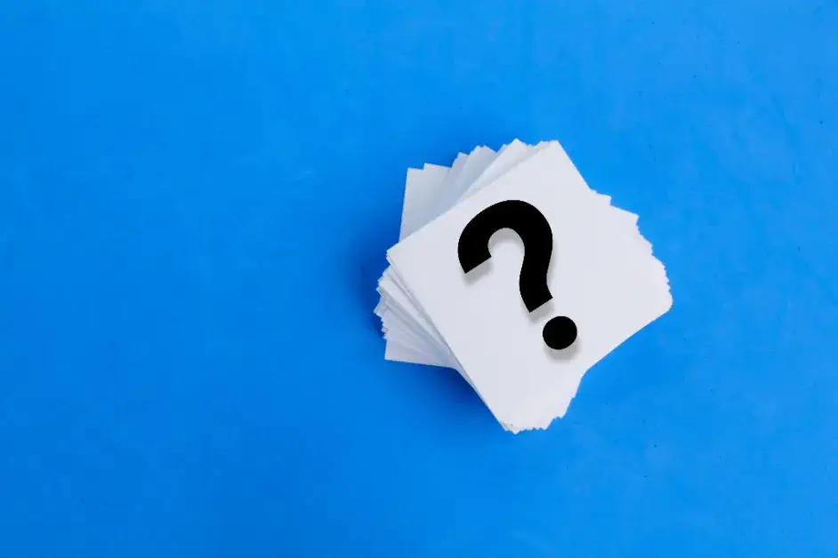 Do I Need a Vapor Barrier in My Basement? A Blue Surface with Sticky Notes with Question Marks on Them