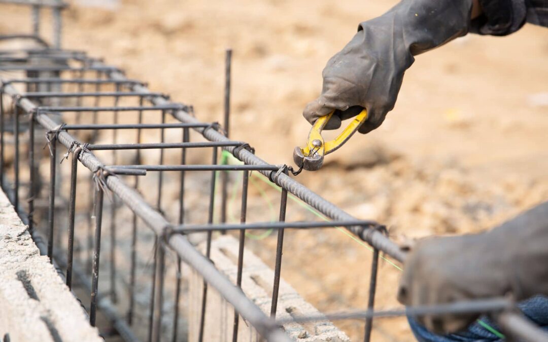 A man fixing reinforced concrete