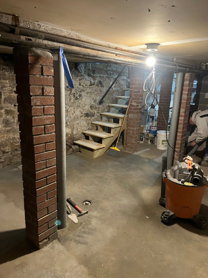 A staircase and beam installation project in a home in Brooklyn, NY.