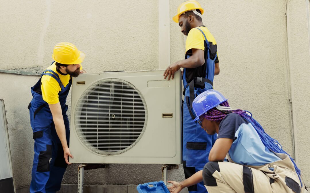 Team fixing a HVAC system in the property