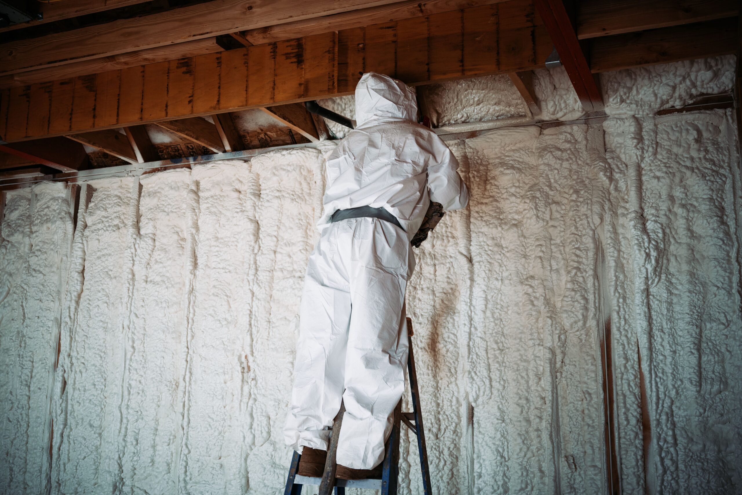 A contractor installation the closed cell spray foam