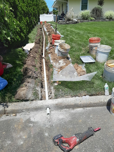 Case Study: Retaining Wall Waterproofing & Drainage Correction in West Sayville, NY