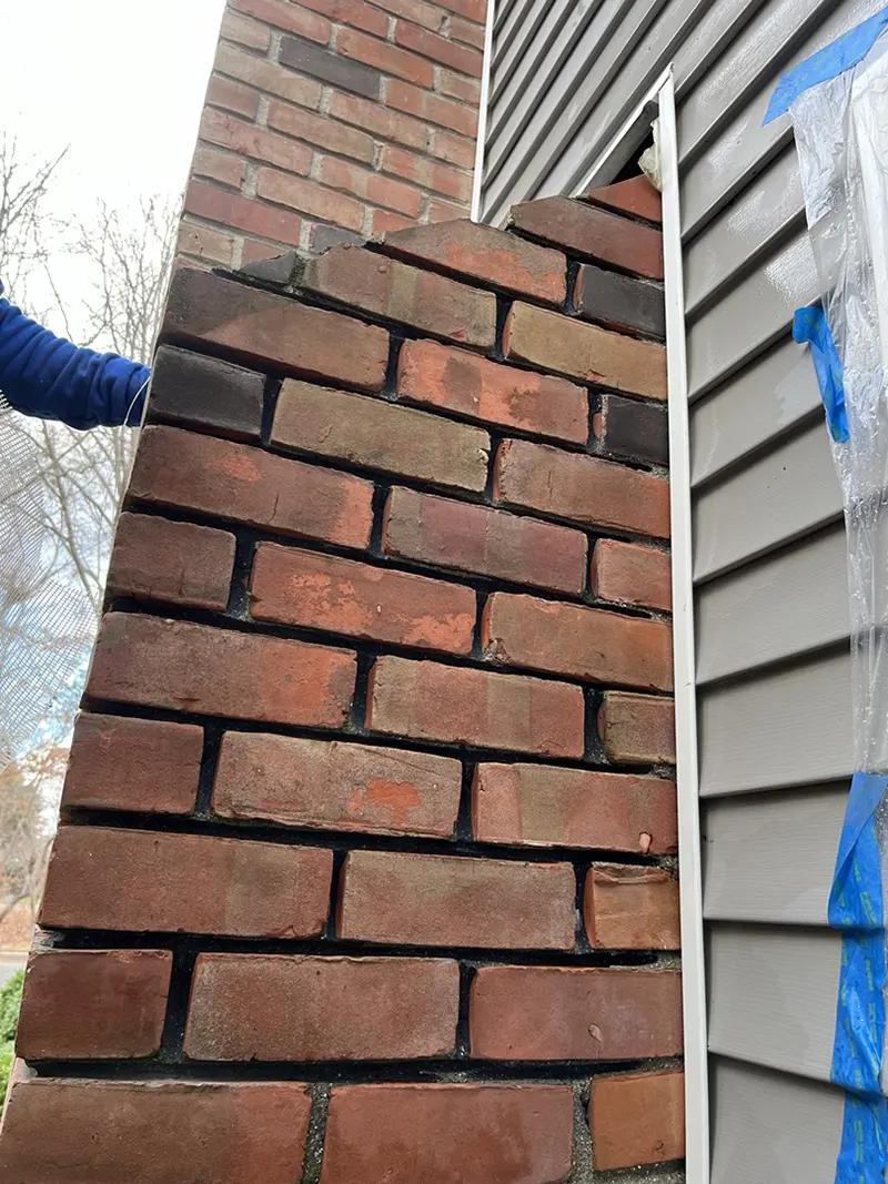 Brickwork in chimney for waterproofing in Northport, NY