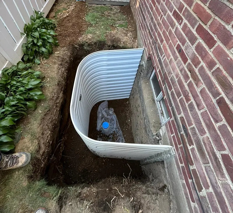 Egress window installation in the basement of the house in Hempstead NY.