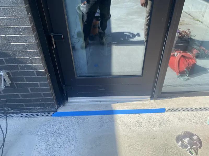 Case Study: Exterior Door Waterproofing and Concrete Repair – Long Island, NY