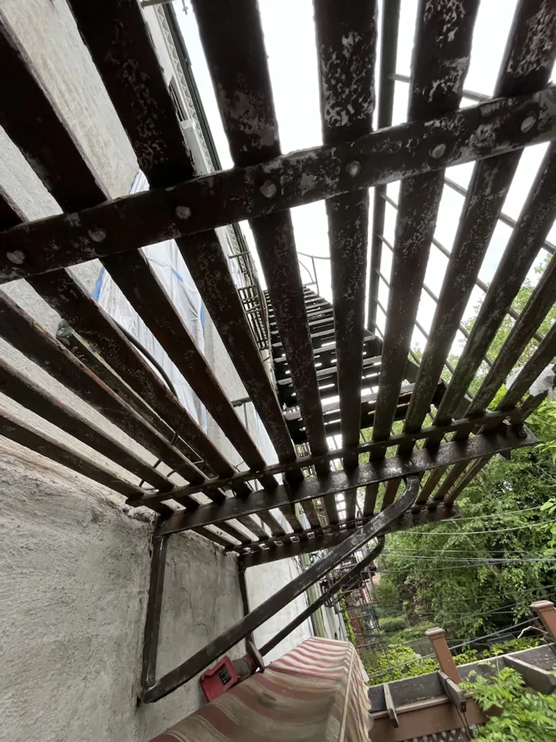 Metal fence in need of repair work in Brooklyn NY
