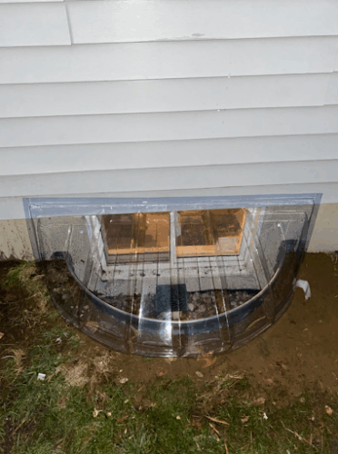 The after picture of window well installation