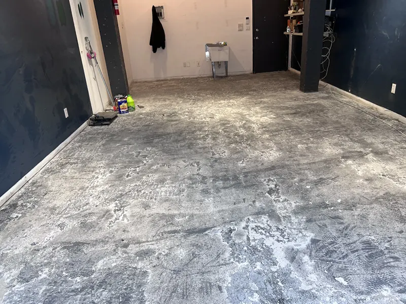 Basement Floor Waterproofing in Commack NY – A Utility Room in Commack, NY, Before Zavza Seal LLC Repaired the Floor