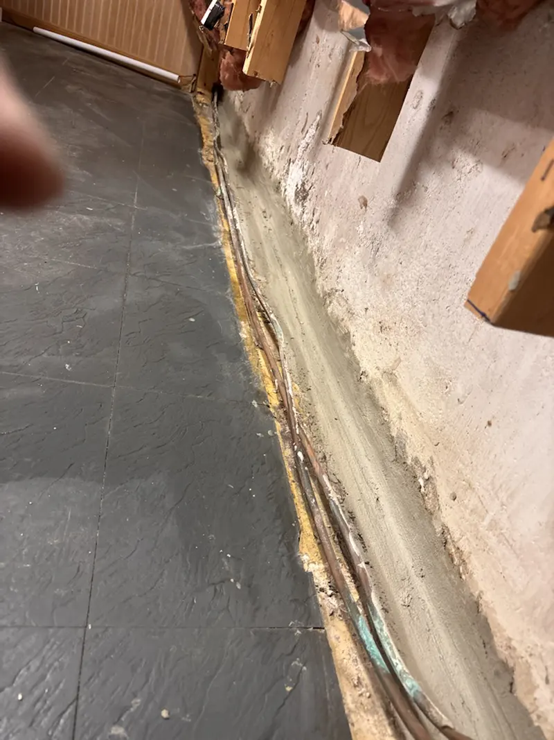 Basement Exploratory Inspection in South Richmond Hill, NY – A Wall Zavza Seal Cut Away to Address Underlying Damages