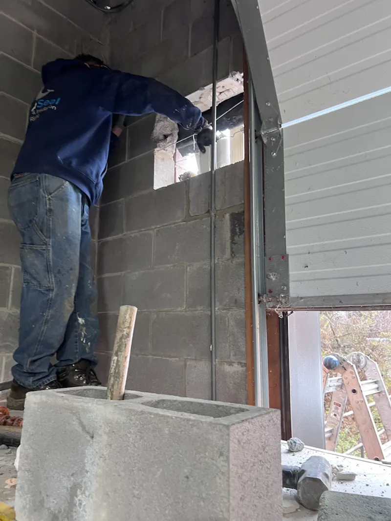 Commercial Structural Repairs – Central Islip, NY - A Door Frame Being Repaired by Zavza Seal LLC