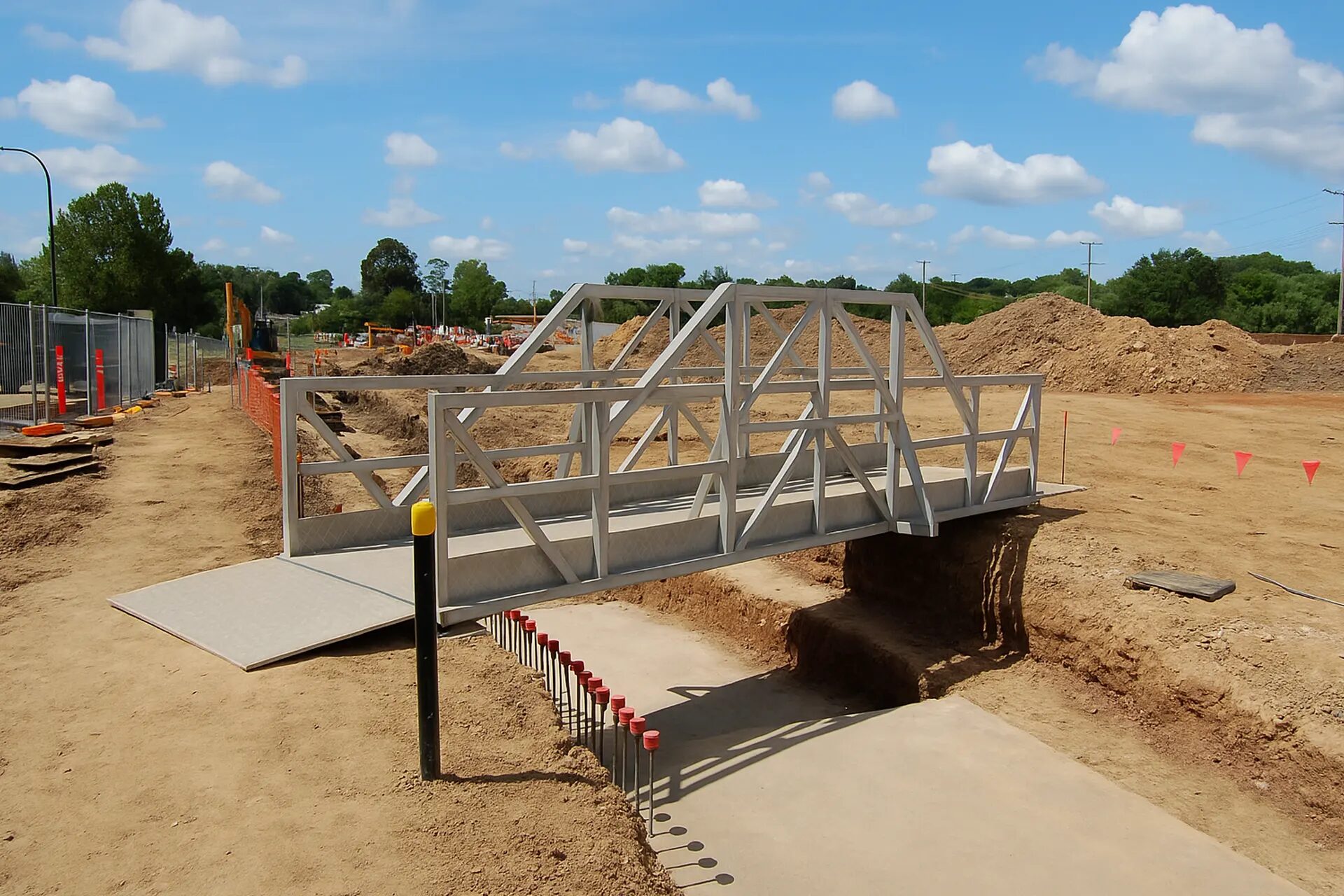 Temporary Bridges for Construction in New York: A Small Temporary Bridge Over Fresh Cement at a Construction Site