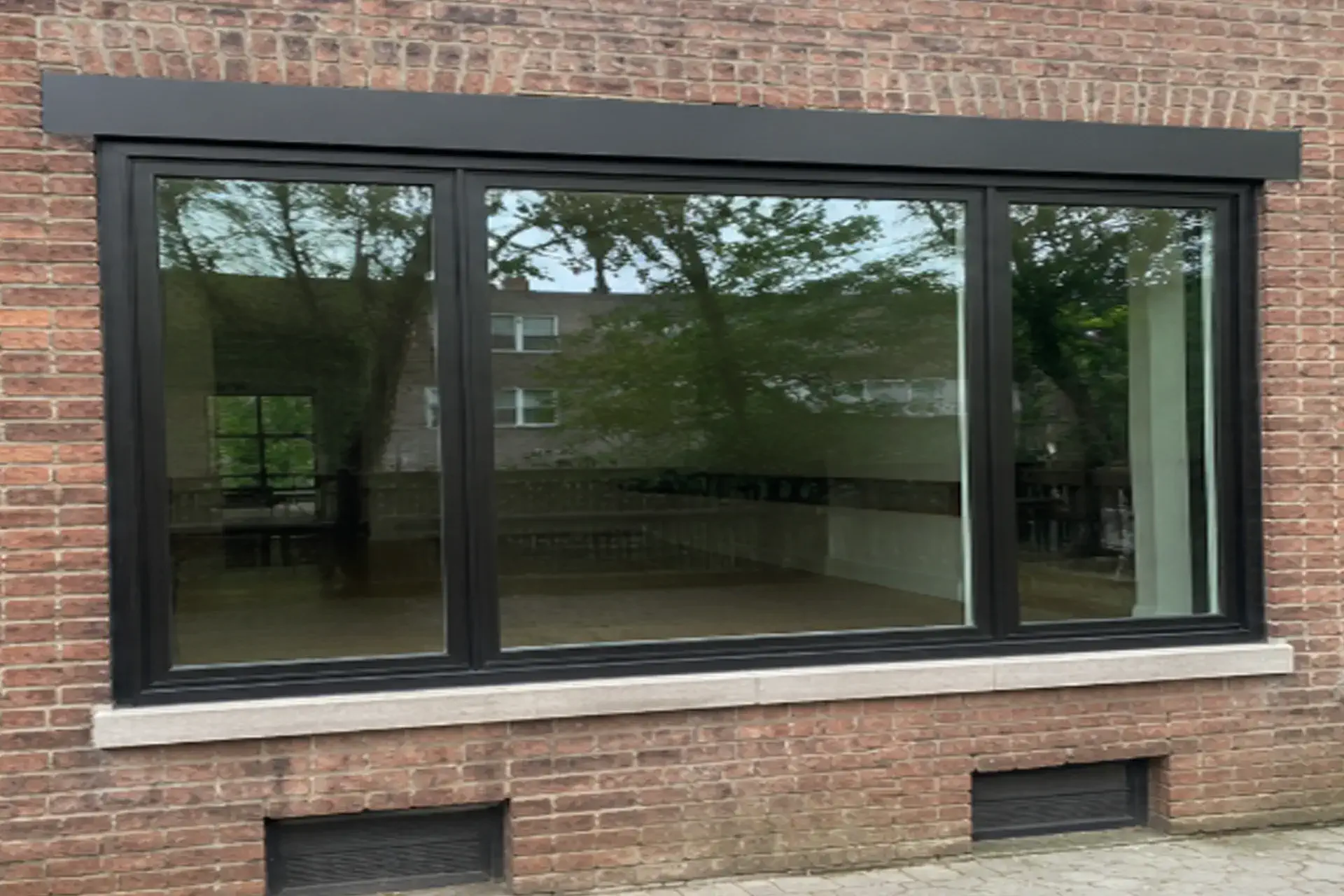 completed-structural-wall-modification-featured Structural wall modification and window installation project in Brooklyn NY with temporary shoring, structural header installation, and enlarged window opening.