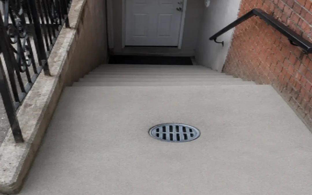 Case Study: Stairway Bottom Landing Drainage Repair in Brooklyn, NY