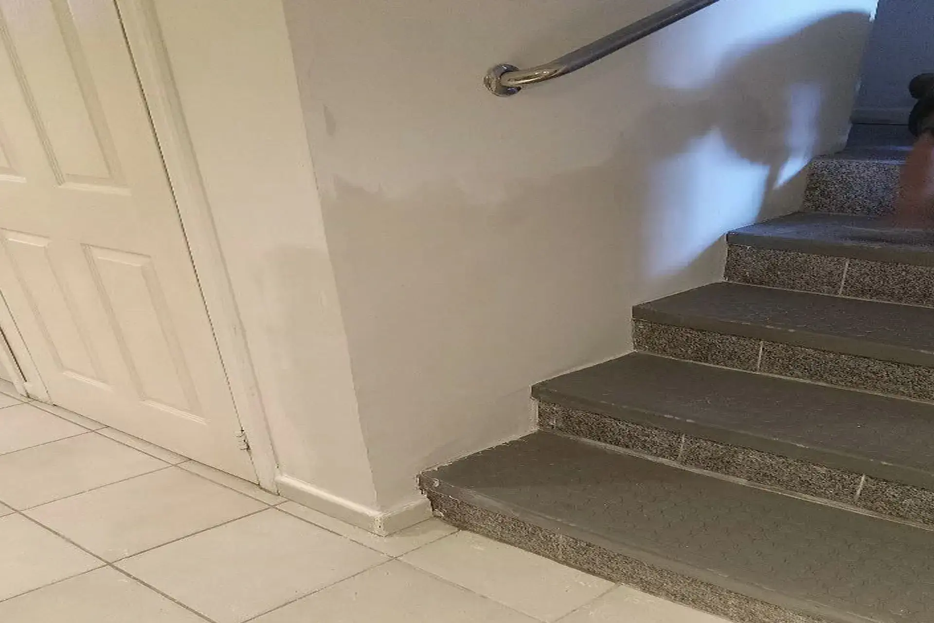 side-entrance-waterproofing-completed-featured Bayside NY side entrance waterproofing completed door saddle sealed pavers reinstalled mortar joints exterior entry repair finished clean condition