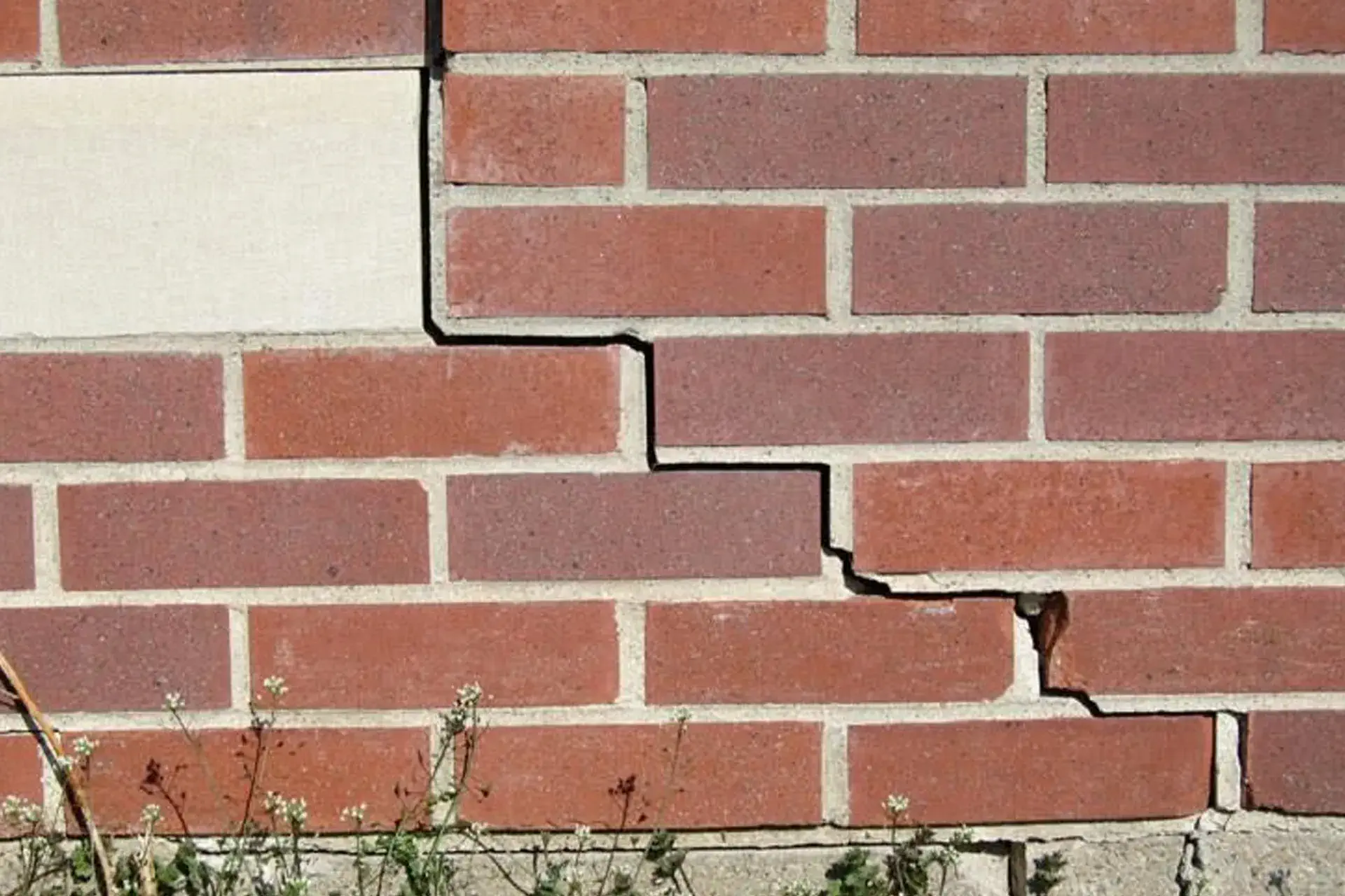 A stair-step structural foundation crack in a home in Brooklyn, NY  