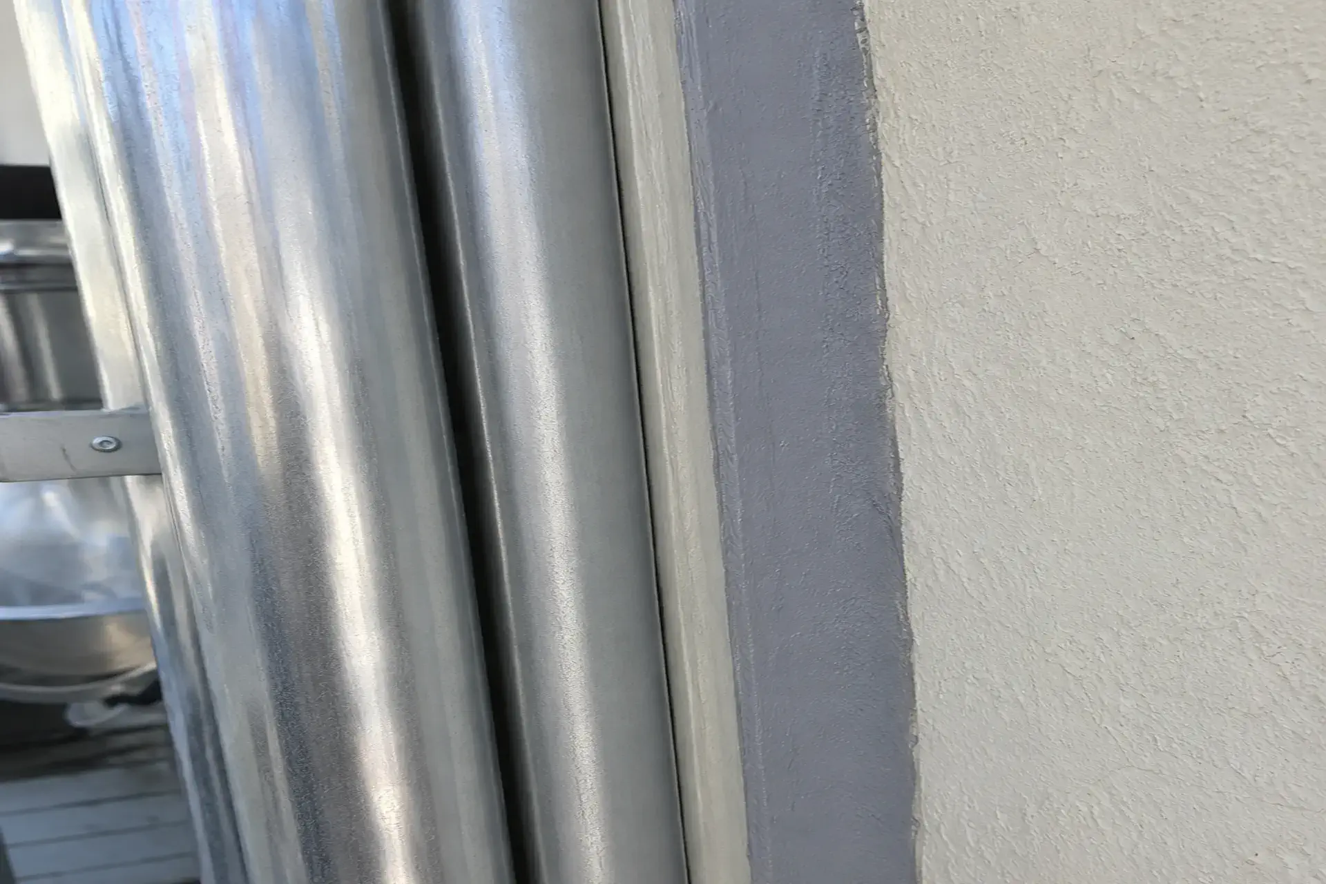 repaired-and-waterproofed-building-expansion-joint-featured Completed expansion joint waterproofing project between two buildings using elastic waterproofing membrane in Brooklyn, NY.