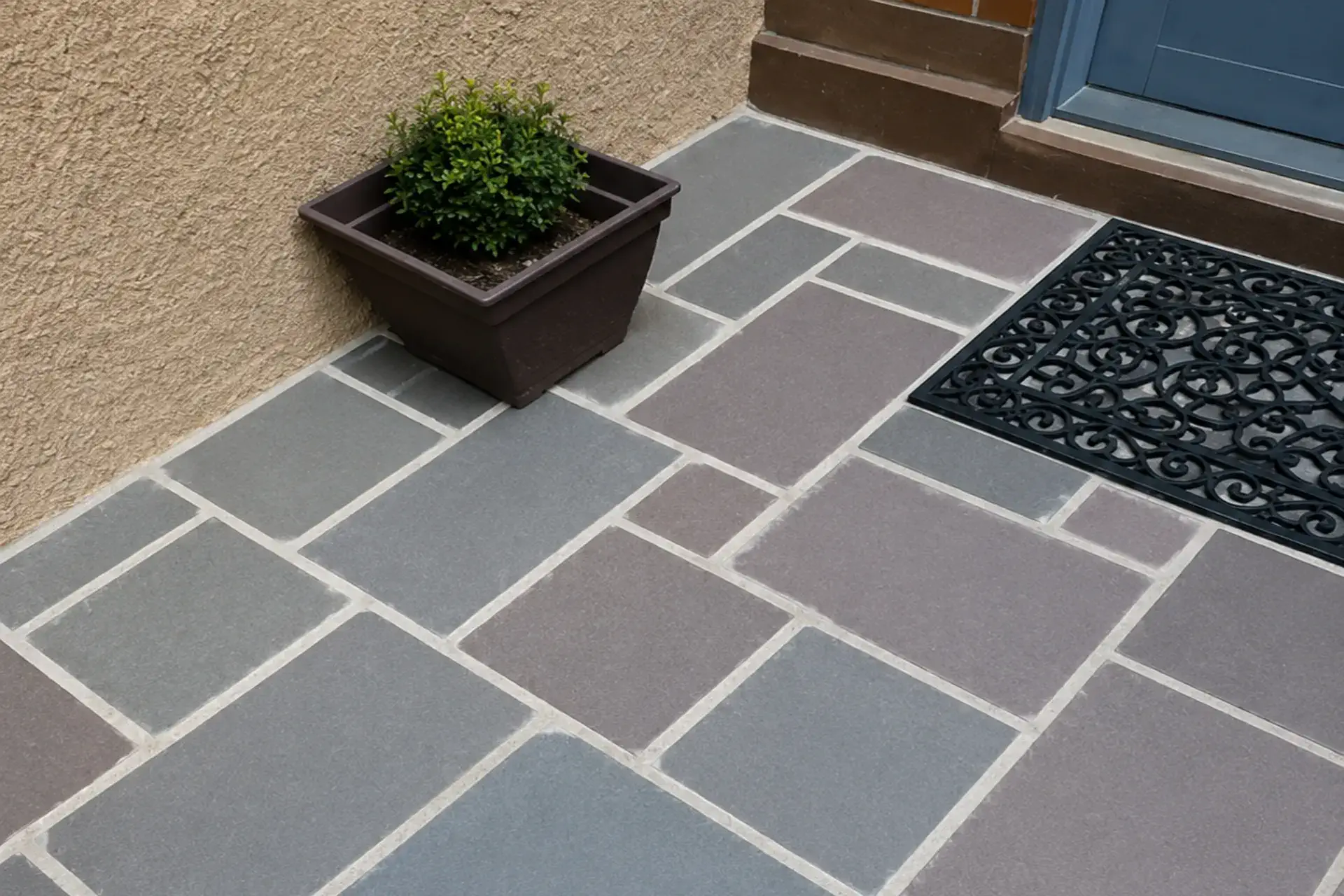 repaired-front-stoop-with-new-grout-featured Completed stoop grout repair and kitchen atrium waterproofing project in Brooklyn, NY with restored masonry joints and sealed glass atrium.