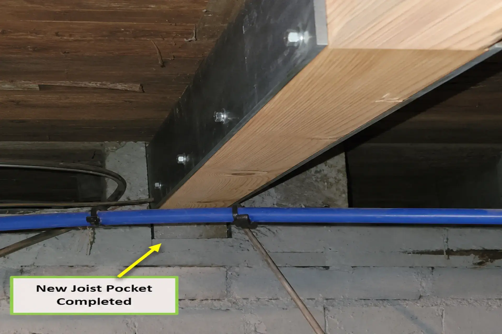 completed-floor-joist-repair-featured Floor joist repair and structural reinforcement underway in a West Sayville, NY home, including new joists and steel plate support.