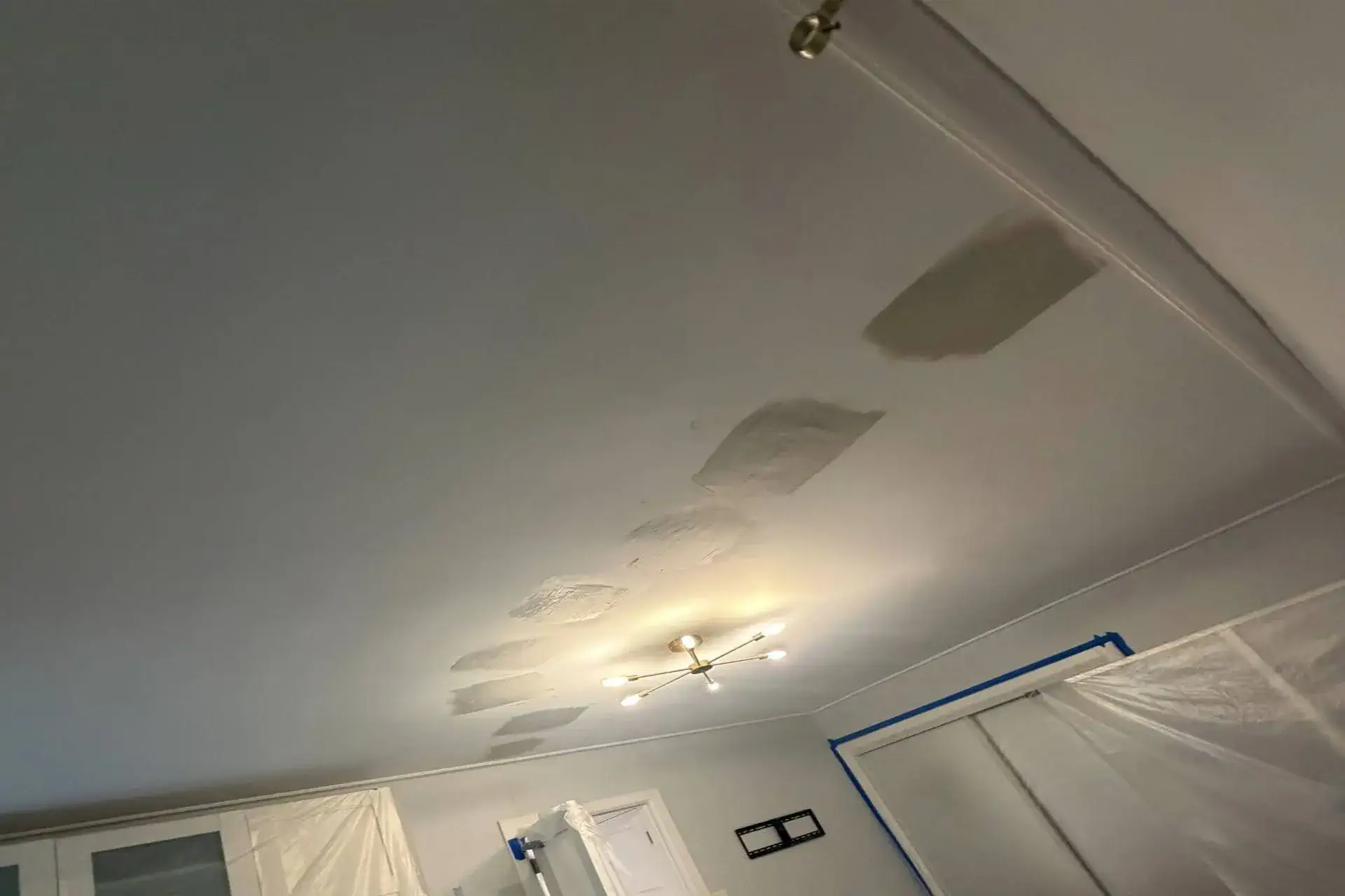 featured-dense-pack-cellulose-insulation After picture showing dense-pack cellulose insulation into a finished bedroom ceiling in a Brooklyn, NY home.