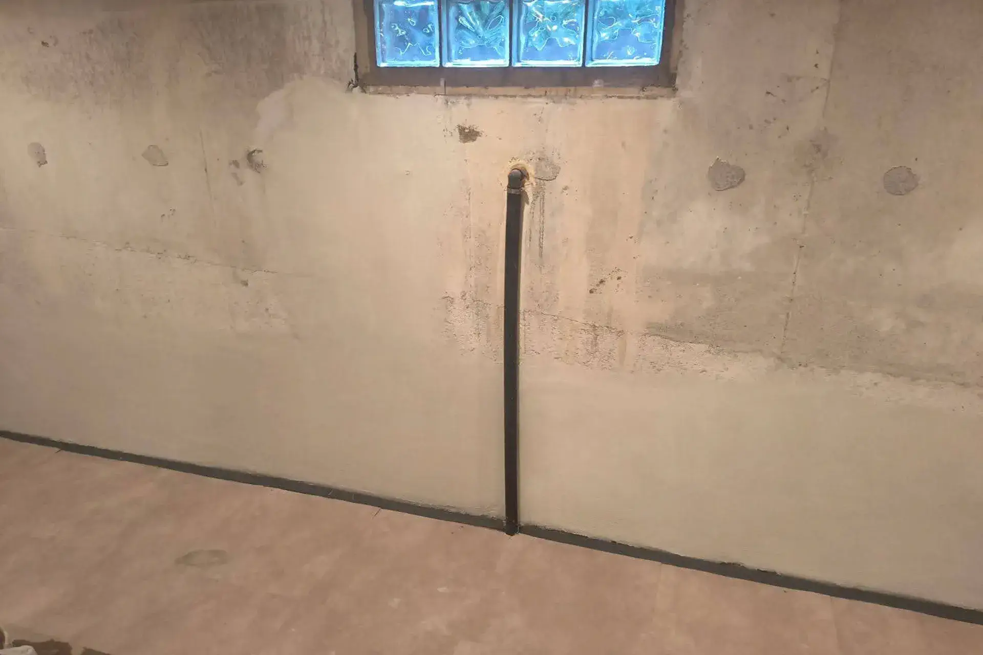 waterproofed-exterior-foundation-wall-featured Exterior foundation crack repair and waterproofing completed at a Woodbury NY residential property.
