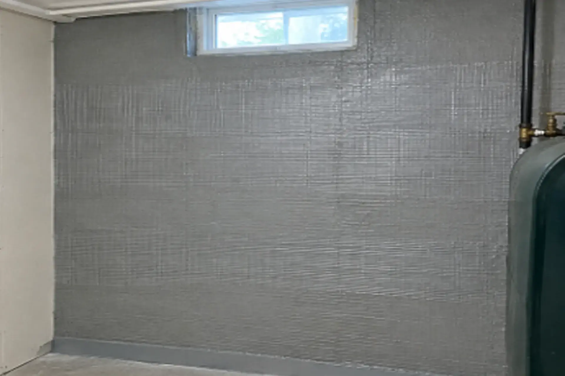 east-northport-ny-basement-foundation-waterproofing-featured Interior basement foundation waterproofing with Basecrete and fiberglass mesh in East Northport NY